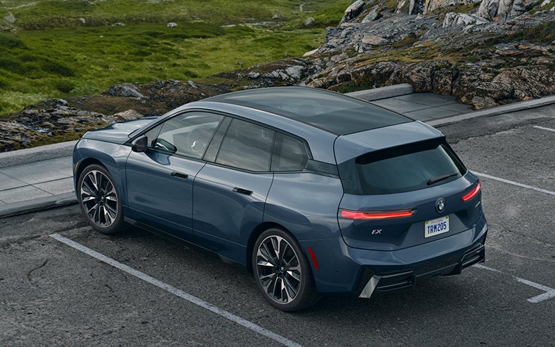 The BMW iX parked in a parking spot. | Enterprise BMW in Appleton WI
